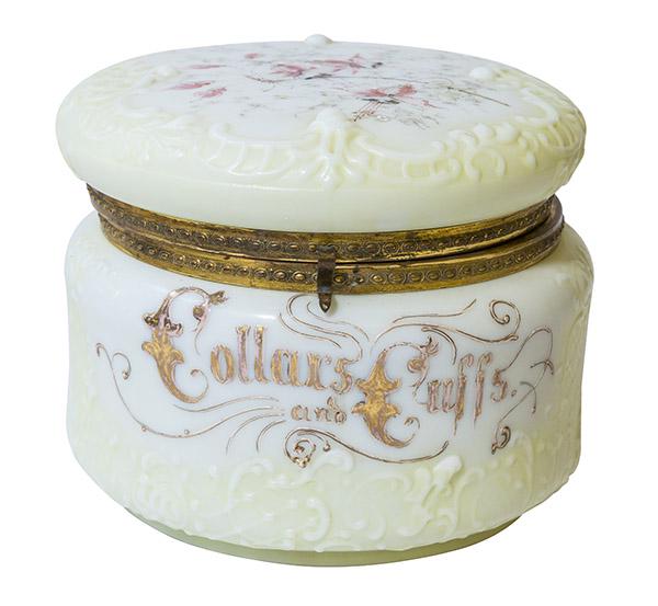 Marked Wavecrest Collars and Cuffs Box: Collar and Cuff box decorated with raised scroll mold. Flower decorated hinged lid that closes with clasp. Gold enamel letters reading Collars and Cuffs. Original lid lining and 2 collars included. Si