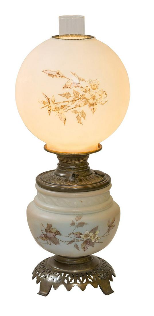 Antique Fenton Double Light Gone With The Wind Lamp: Pierced footed border with opaque base and globe with hand decorated flowering branches. Base has round bass cap with embossed gadroon border supporting the canister and globe. 8" Dia x 21 3/4" H