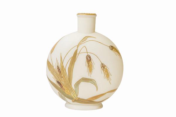 Marked Smith Brothers Art Glass Vase: Moon flask vase, gilded trim to enameled floral wheat decoration on the front and back, 19th century. Marked with Smith Brothers trademark, a lion in a shield with Trademark printed below. 7" W x 2 3/