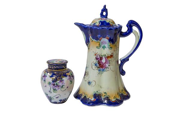 Nippon Chocolate Pot and Ginger Jar: (1) Early Cobalt blue Nippon Chocolate Pot with colored flowers and gold trim. White enameled beading highlighting the pot. Colours are crisp, surface is clean, decor is exquisitely detailed. Unmarked
