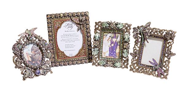 Kirk Folly Picture Frames: Four various embossed metal frames with grogs, rhinestones, semi precious stones, parrot and enamel. Manufactures mark to each. 5 1/4 x 4 largest