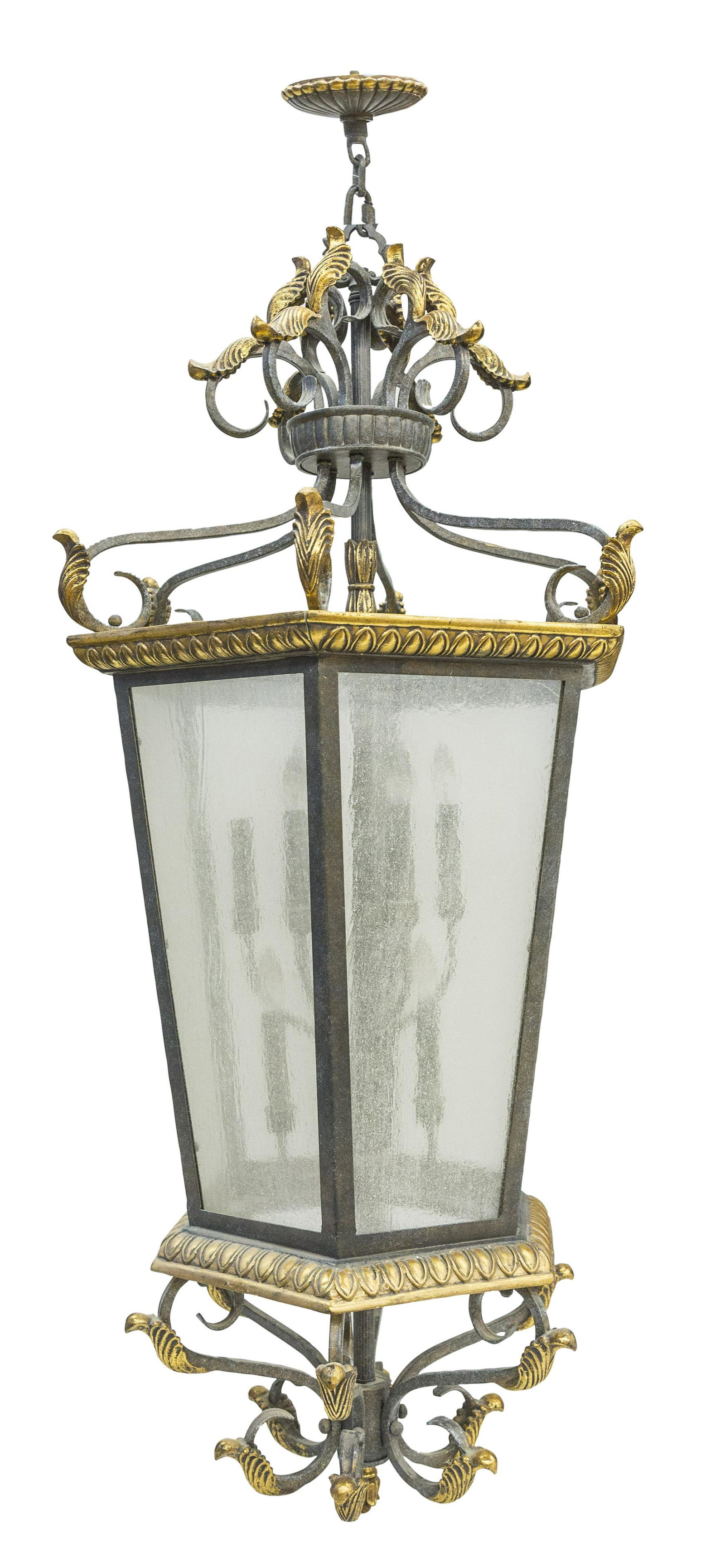 Outstanding 20th Century Neoclassical Light Fixture: Hexagonal hanging light fixture. Brass plated metal, gun finished metal and gesso with six frosted glass panes with scrolled supports and arms. Nine interior branches. 29 1/2w x 25 1/2d x 64h (not inc