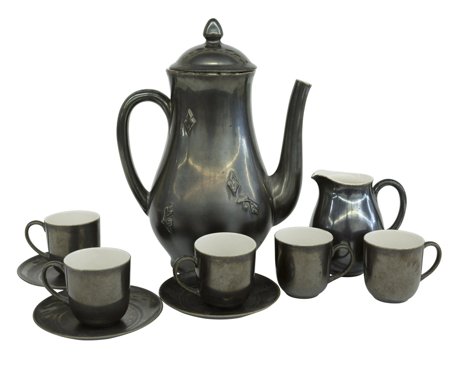 Rookwood Pottery Teapot #6520 Plus: Teapot, #652, creamer #6525, (3) saucers #6524 and (5) cups #6524. Unusual gun metal matt glaze, RP logo, dated 1935 and shape numbers to underside. Teapot- 7.5w x 4.75d x 10h