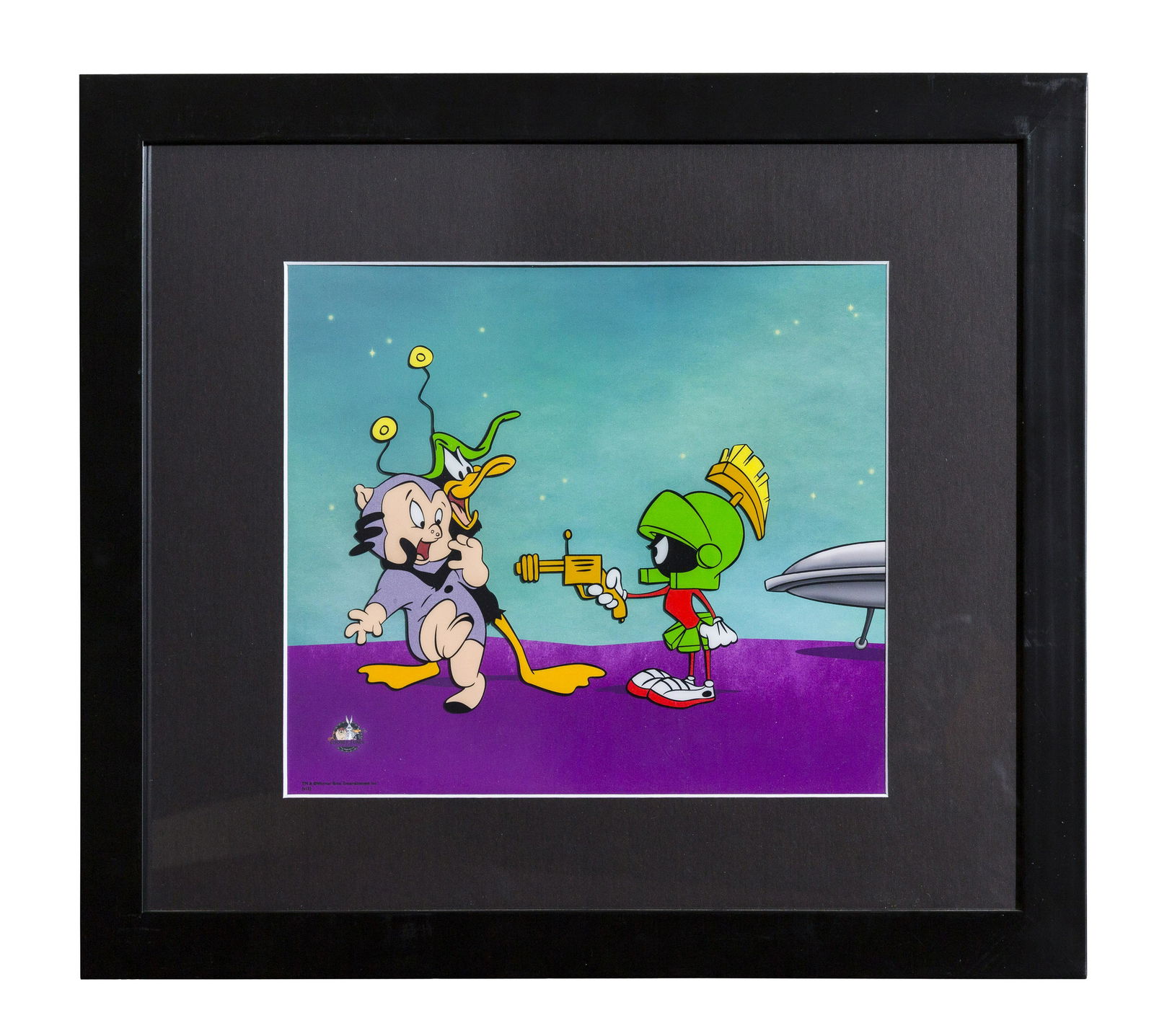 Marvin/Porky & Daffy Sericel: A Warner Bros. 12-field limited edition sericel featuring Marvin Martian, Porky Pig and Daffy Duck. Presented framed 17" x 20" with Classic Moments COA