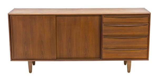 Illum Wikkelso (Attribution) Credenza: Cabinet/ credenza, A. Mikael Laursen, Denmark, 1960. Teak, cabinet features four drawers and two sliding doors. Concealing shelves and three drawers that can be used as serving trays. 72w x 18d x