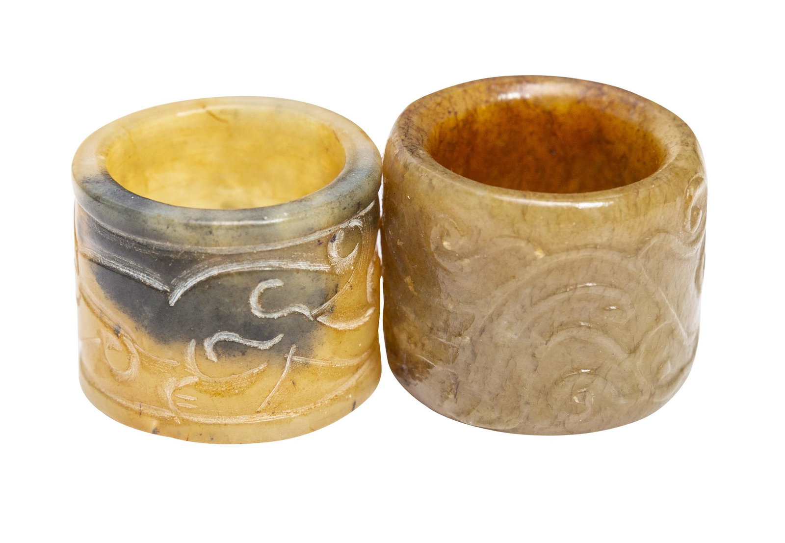 Chinese Archer Rings: (2) Chinese antique archer rings each with carved designs. 1.31dia x 1.5dia