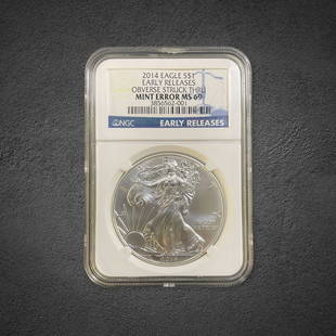 2014 Silver Eagle $1 Coin Mint Error: 2014 Silver Eagle $1 coin. Obverse struck thru mint error. Graded MS 69 by NGC.