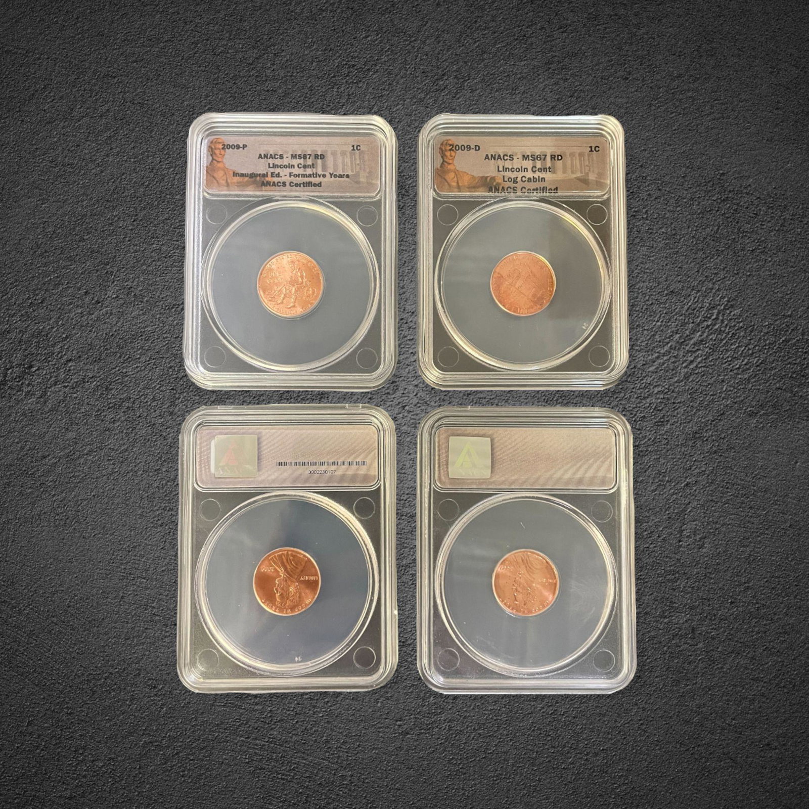 2009 Lincoln Log Cabin Penny Coins: (4) 2009 Lincoln Log Cabin penny coin. All graded MS 67 RD by Anacs.