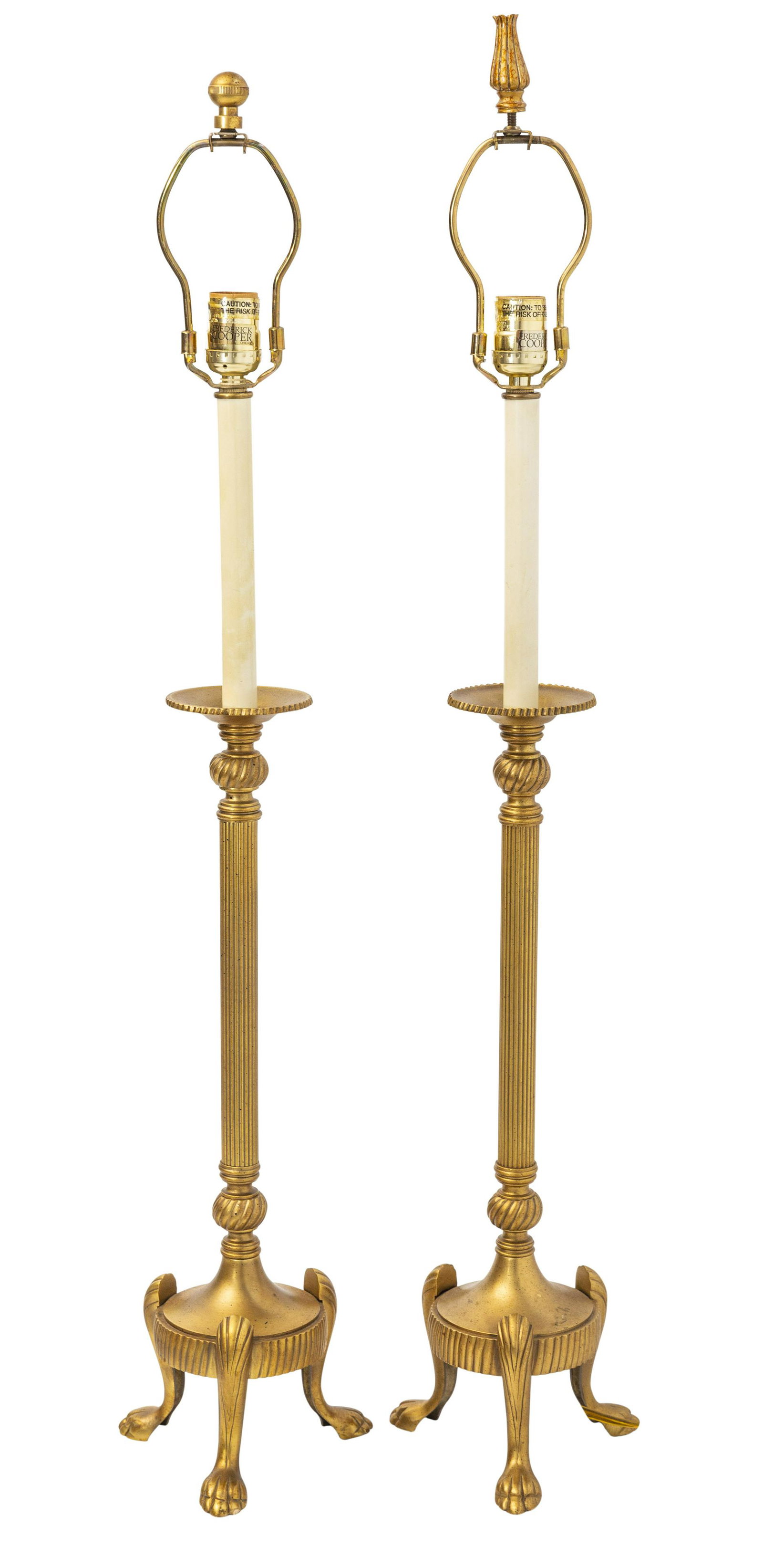 Frederick Cooper Brass Table Lamps: Pair of brass plated claw-footed classical table stick candle lamps. Manufacturer's mark to top. 6.75w x 6.75d x 34h