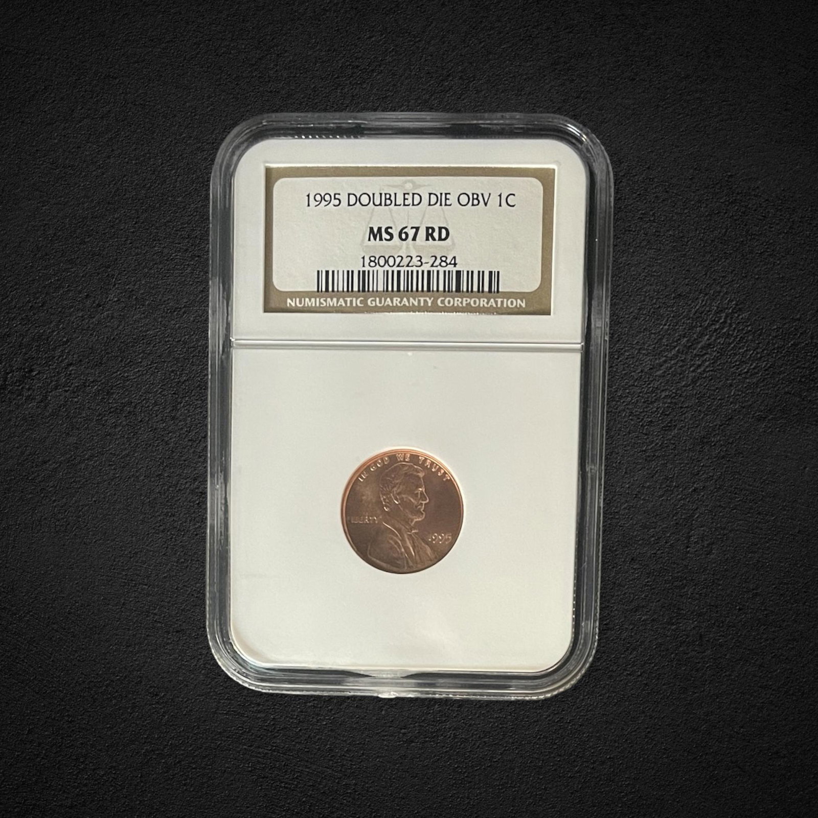 1995 Red Lincoln Dbl Die Obv Coin: 1995 Red Lincoln penny coin. Graded Doubled die obv MS 67 Red.