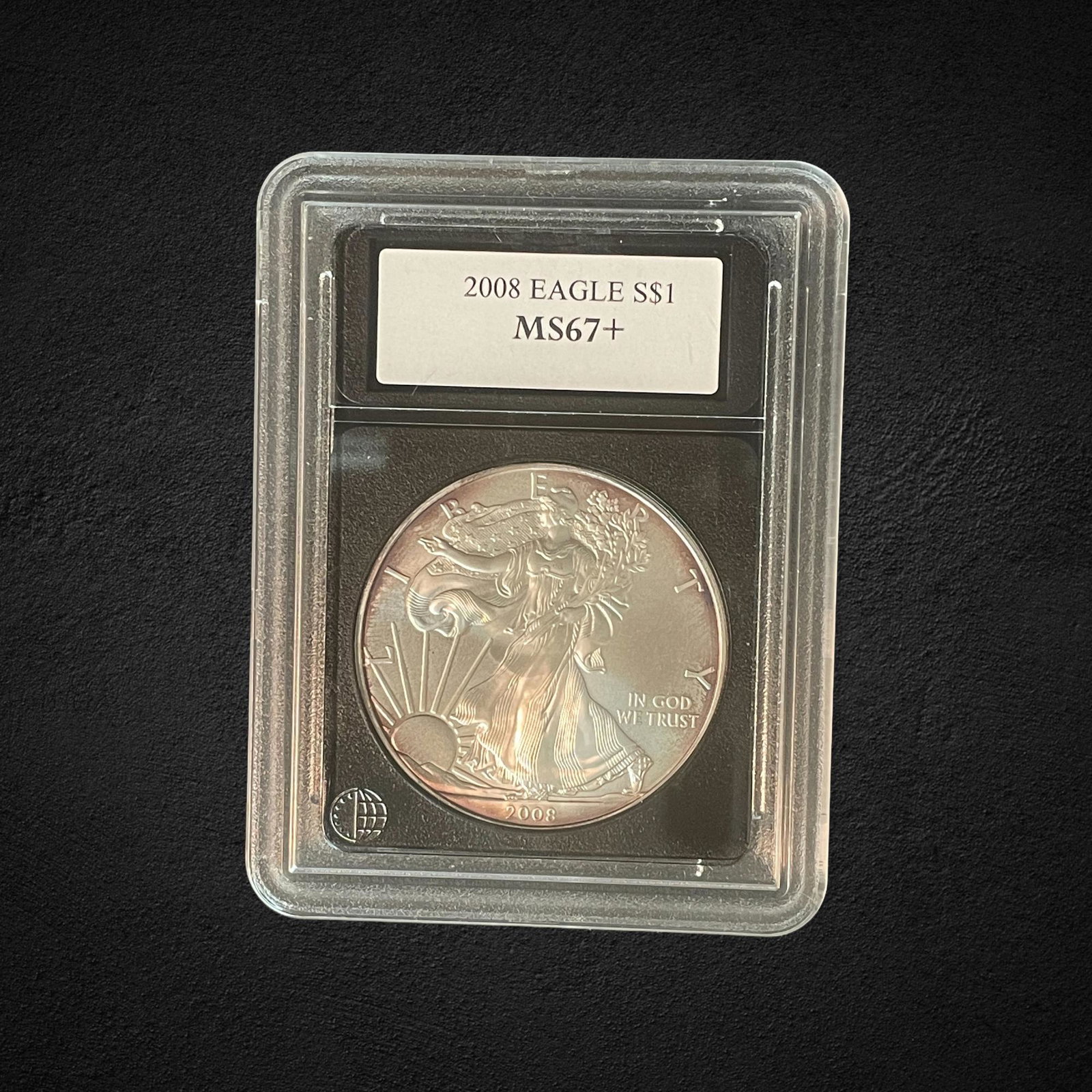 2008 $1 Silver Eagle Coin: 2008 $1 Silver Eagle coin. Graded MS 67+ by Paramount R.C.C.