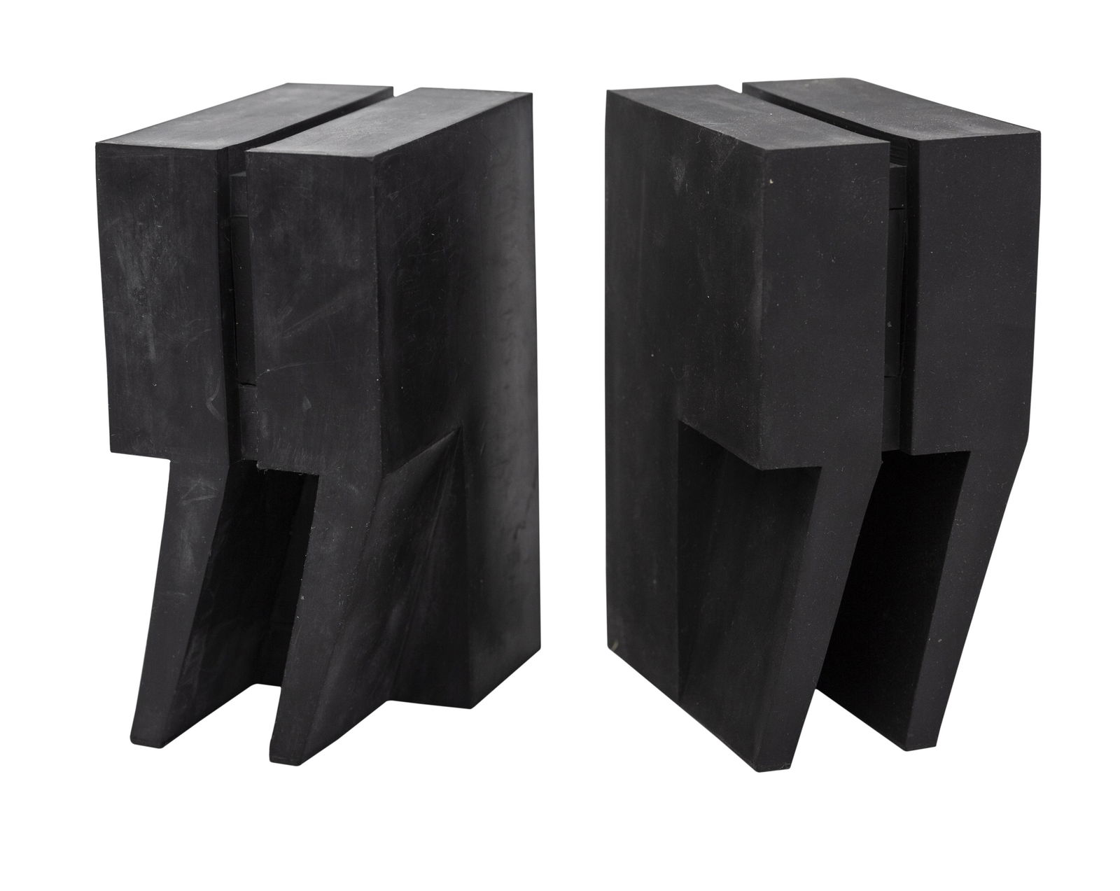 Eric Janssen Merlo-T Bookends: Bookends, pair, Merlo-T, Denmark, circa 1979/1980. Concrete core with synthetic rubber exterior. 3w x 6d x 4h