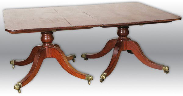 English Mahogany 19th c Dining Table: double pedestal, brass caps, Regency/Duncan Phyfe 49W x 29H x 74L plus 32" leaf (one only)