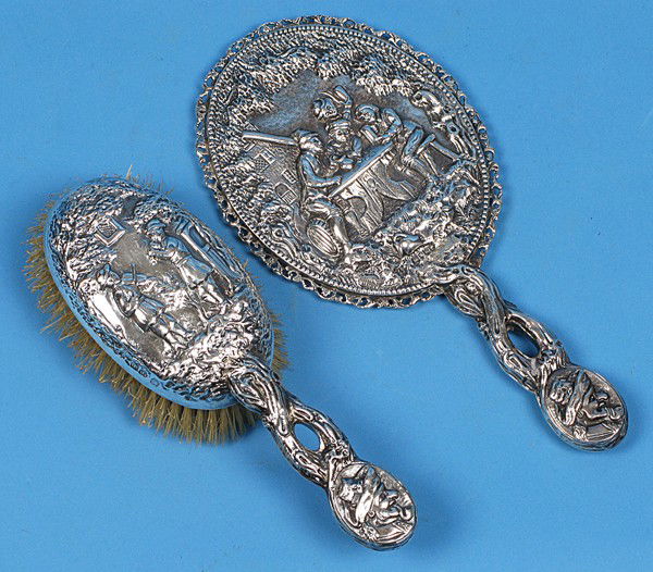 Sterling Brush, Mirror: JR/SJ ornate with twig handles and medallion bust of gentleman smoking pipe, mirror hand chased with classical tavern scene Artist: London Hallmark 1885 Size: 10.75 mirror, 9" brush