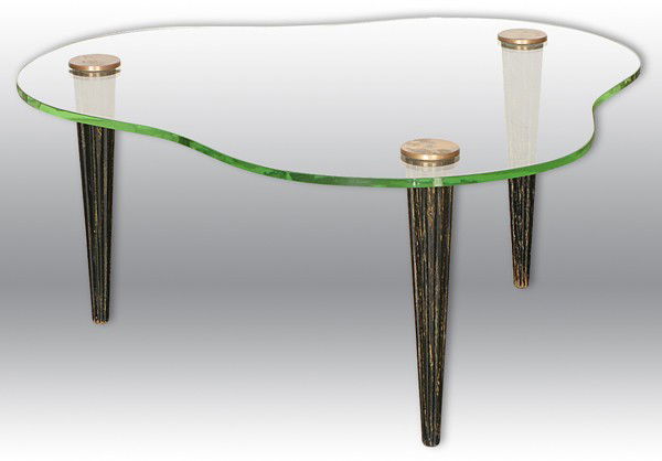 Gilbert Rohde Cloud Table: By Herman Miller, original light green glass top over three tapered wooden legs Artist: Gilbert Rohde/Herman Miller Size: 37W x 22D x 23H