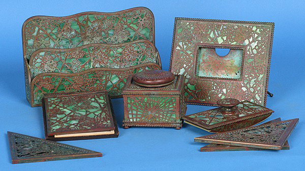 Tiffany Pine Needle Desk Set: Tiffany Studio bronze & Glass desk set, six pieces, blotter corners, picture frame, ink well, letter holder, address book, all marked Tiffany Studios #987, 940, 844, 1008, 1022 respectfully Size: lett