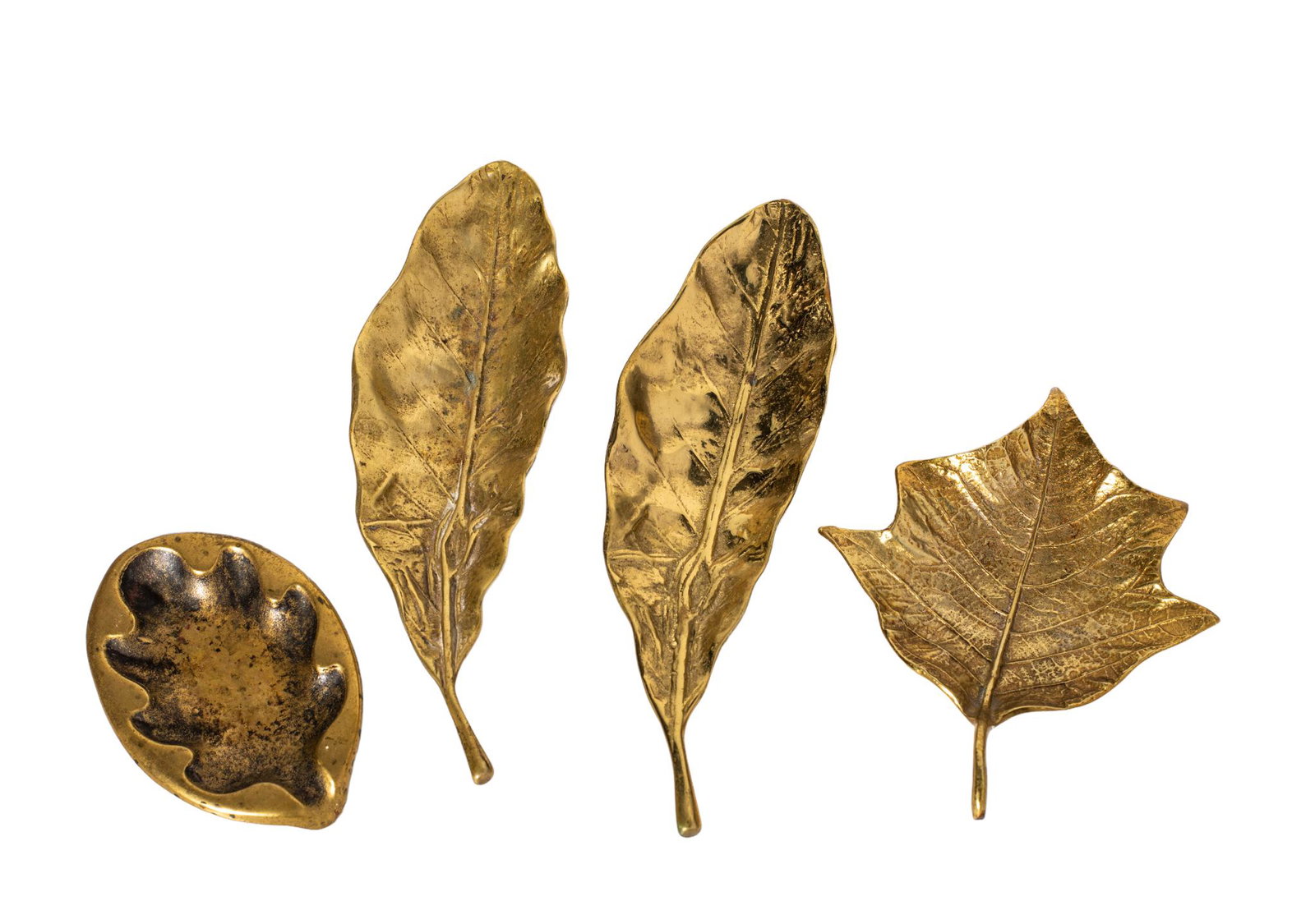 Virginia Metal Crafters Tobacco and Leaf Dishes: Designed by Oskar j. w. Hansen, 1963. Leaf dish is 1948. 8.625w x 2.75d x 1h