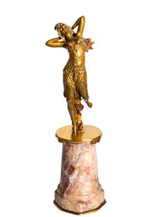 Henri Fugere (1872-1944) Bronze (France): Gilded bronze art nouveau maiden fixing her hair with head dress. Shaped aprons and scrolled base resting on original stepped red marble pedestal. Circa 1900. Stamped signature to verso and #2467 6w x