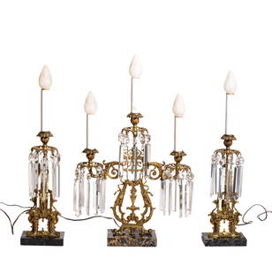 Gothic Revival Girandole Set: Fine cast bronze electrified girandole set with marble bases. Crystal prisms. Sides- 6w x 4.5d x 25.25, center- 17w x 4.5d x 26.5