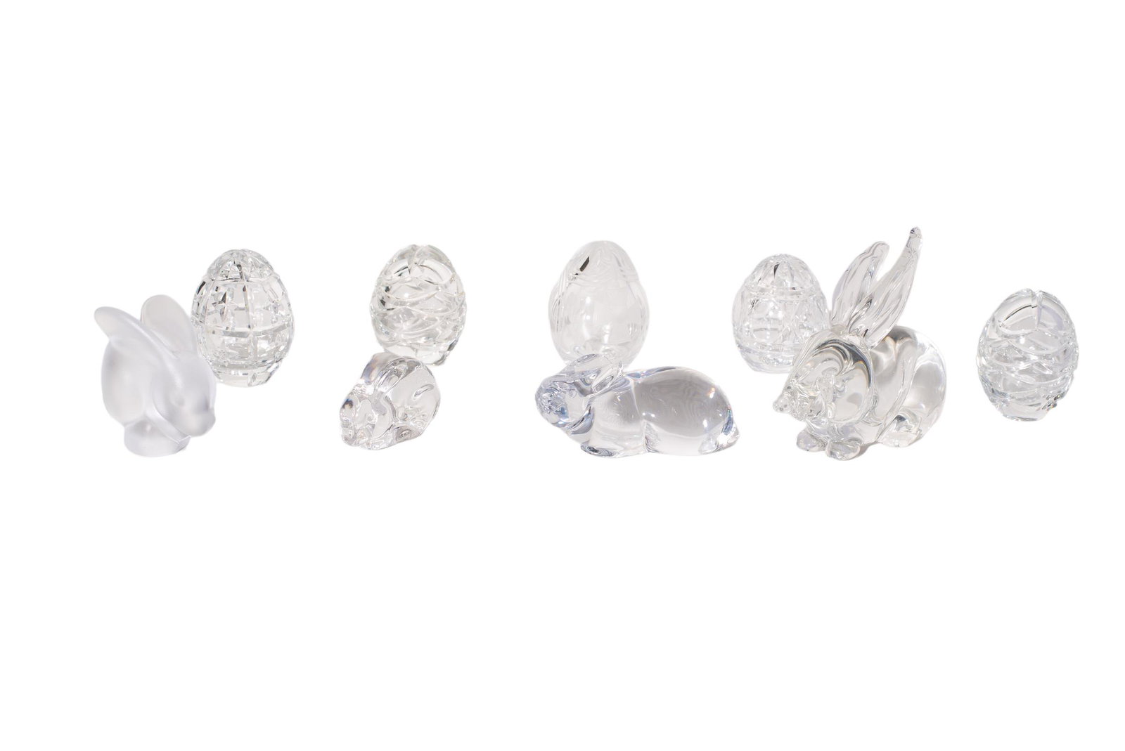 Assembled Faberge Crystal Eggs Plus: Faberge Eggs. Five all signed with incised signature and #'s to 4, 1051, 1276, 0352 and 1242. 4 rabbits signed cartier, FC France, val staint lambert and serres cartier rabbit.