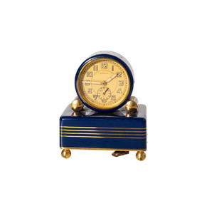 Apollo Art Deco Swiss 7 Jewel Alarm Clock: Clock. Blue enameled case with brass inlay resting on ball feet. Working condition. 2.875w x 2.25d x 3.5h.