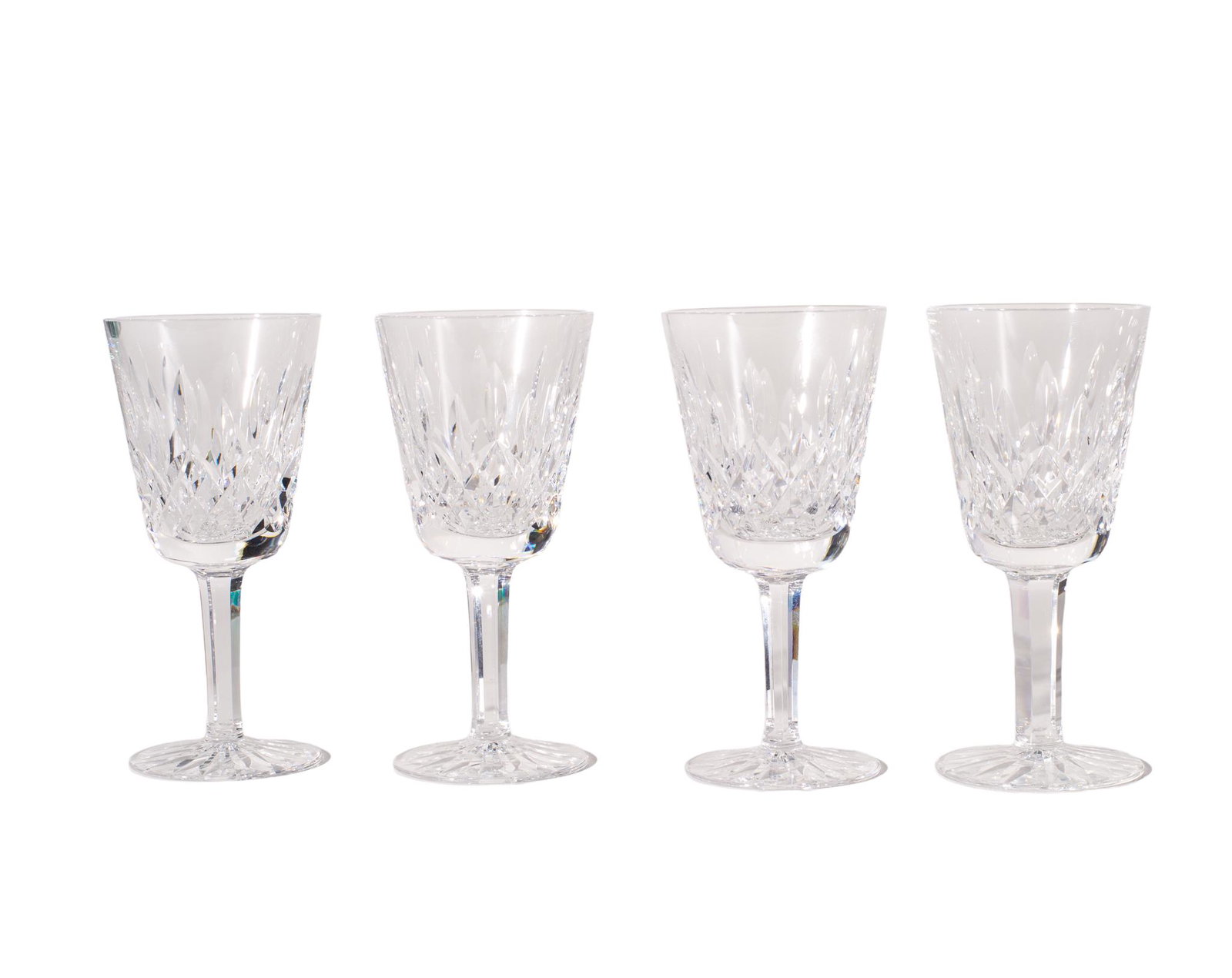Waterford "Lismore" Whiskey Sour Glasses: Whiskey Sour Glasses. Set of four, manufacture's incised signature to underside. 2.75dia x 5.75h.