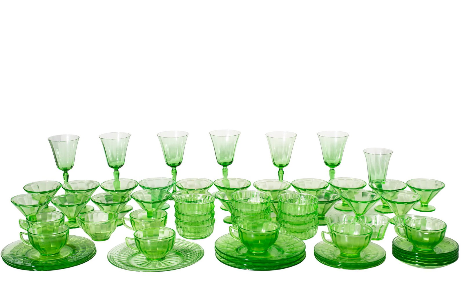 Fostoria Green Depression Glass Plus: Depression Glass. 66 total pieces. 21 Fostoria sherbets, 8 cups and 5 saucers. 32 pieces comprising of 6 wine glasses, 1 water glass, 12 finger bowls, 3 cups, 3 plates, 3 plates, and 4 bread and butte