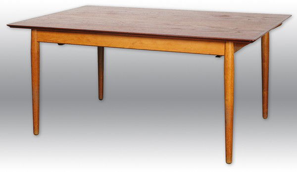 Arne Vodder Sibast Dining Table: Large, fine Dining Table, two leaves, tapered borders, branded manufactures on underside, manufactured by George Tanier Selection Size: 29H x 39.25W x 60L Two leaves 22.5 each