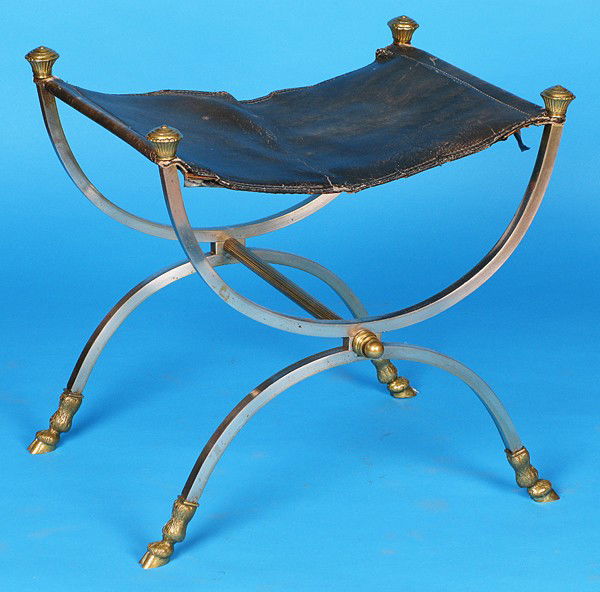 Maison Charles (attribution) Stool: Chrome plated steel, brass finials, hoof feet, leather top