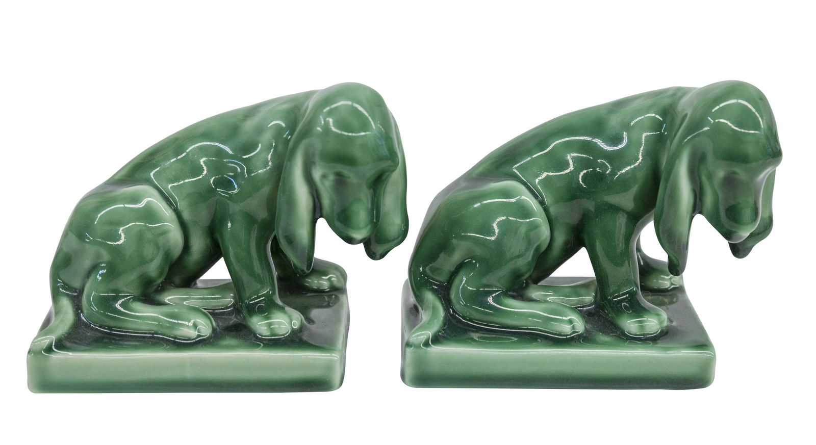 Rookwood Pottery "Hound Dog" Bookends #2275: Pair of bookends in high green glaze. Dated 1952, RP logo, and shape #2998. 6.25w x 3.75d x 5h