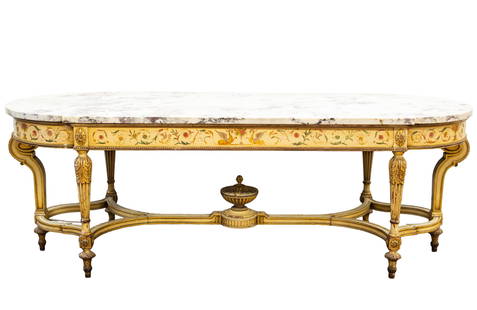 Outstanding French Marble Top Parlor Table: Parlor Table. Circa 1920's, French provincial style hand decorated base. Fine shaped 1.25" marble top resting on decorated apron with floral motif and winged griffins. Six scrolled and fluted legs