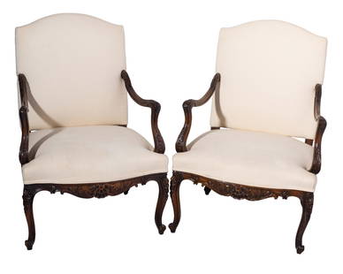 Country French Mahogany Lounge Chairs: Lounge Chairs. Pair mahogany frames with carved shells and acanthus leaves. Resting on scrolled feet. Fine embossed upholstery. 27 1/2w x 26d x 39 1/2h, SH-17