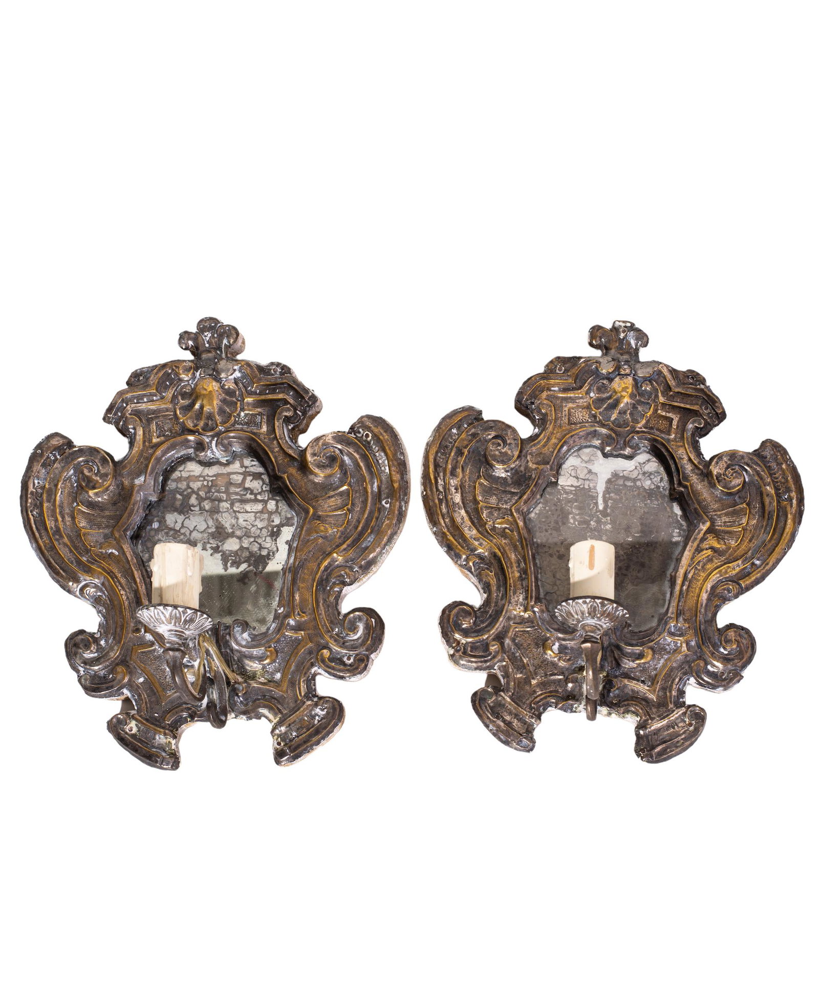 Pair of Antique Cadle Sconces: Pair of sconces, 1940, brass platted tin over wood with embossed foilage and shells. Distressed finish. 9w x 4d x 11h.