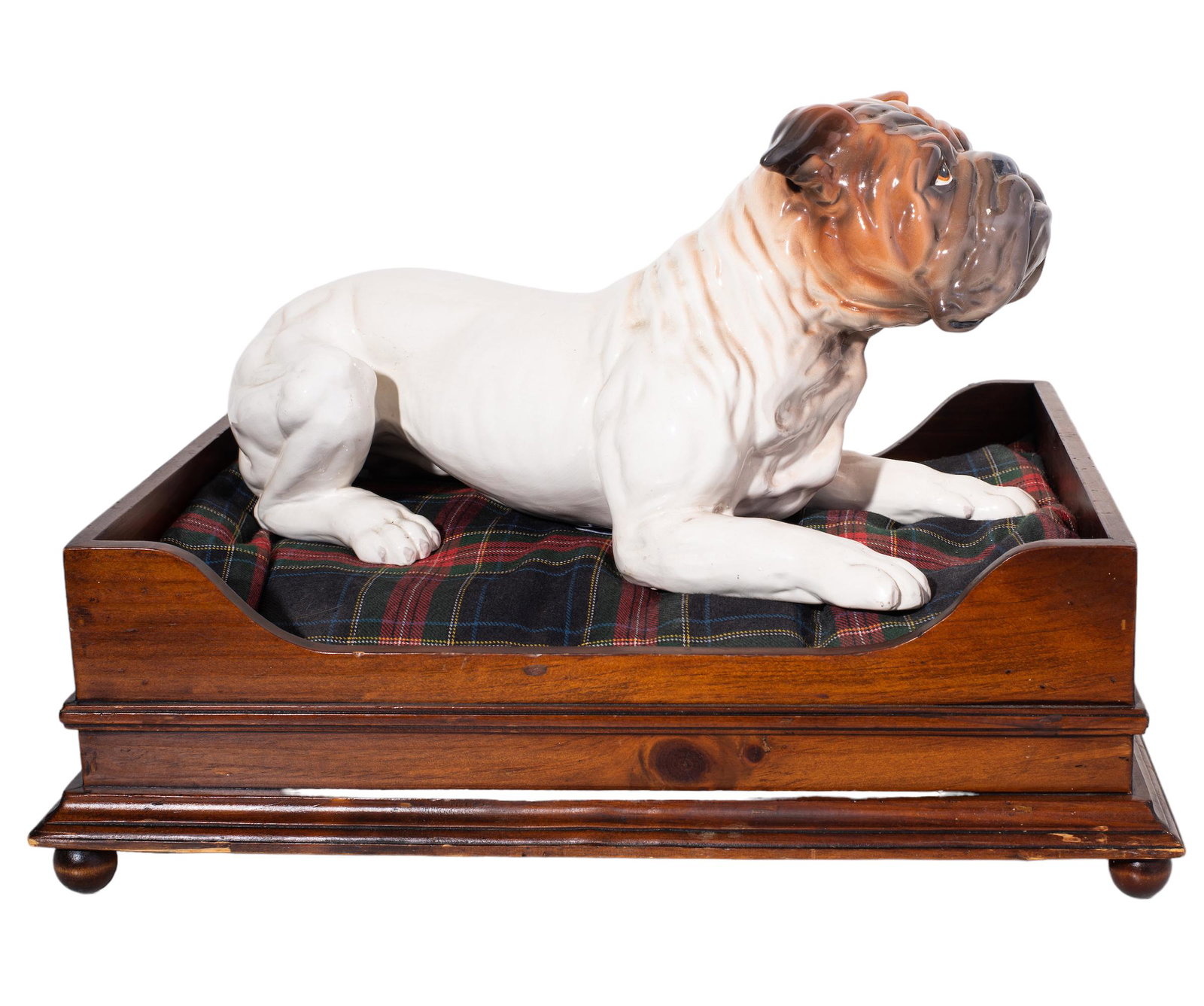 Stoneware Bulldog on Dog Bed: English stoneware bulldog laying on a tartan pillow fitted in pine dog bed resting on ball feet. Dog- 20w x 10d x 9 1/2h, Bed- 20w x 16 1/4d x 7h.