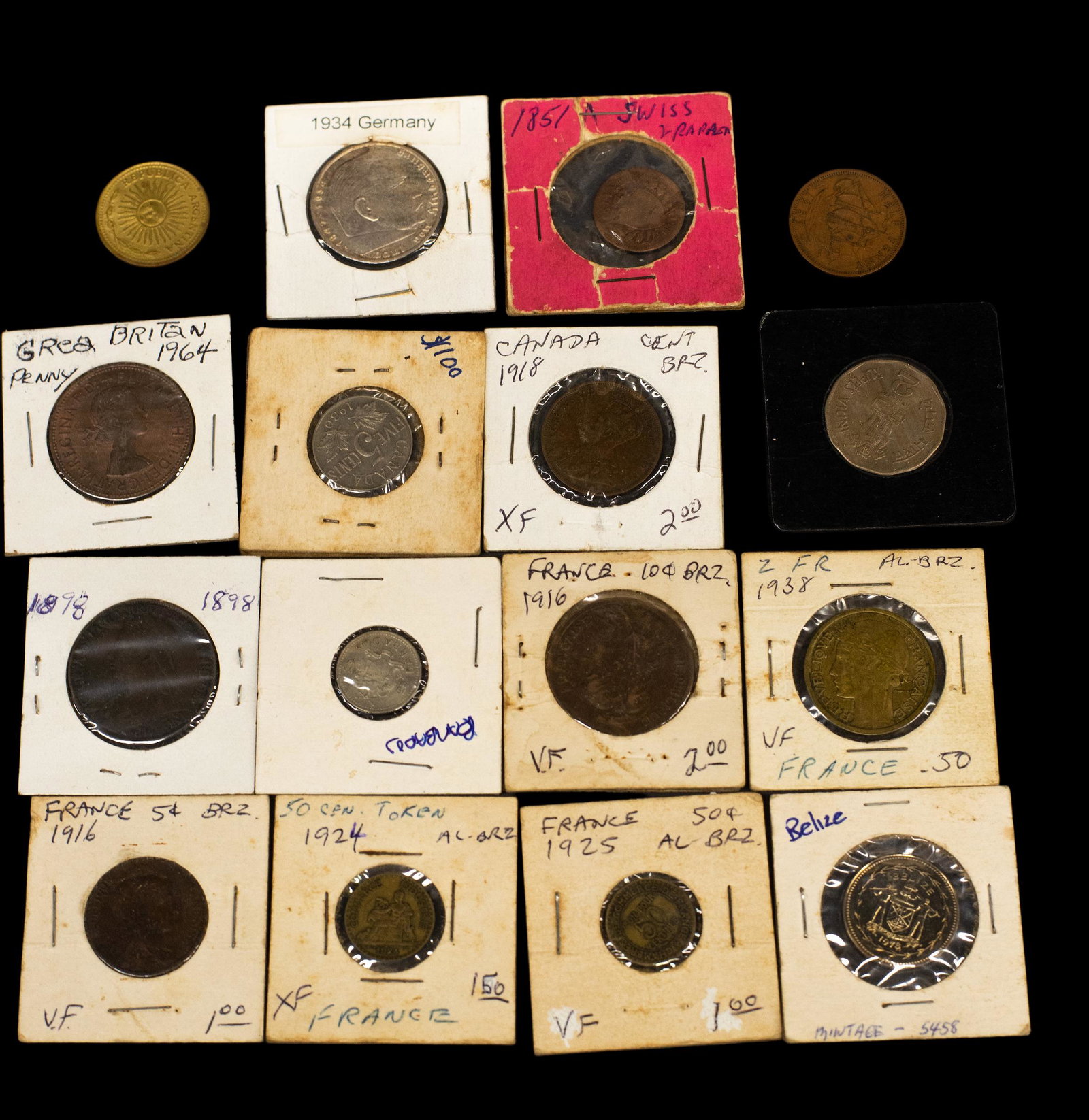 International Antique and Vintage Coin Group: (16) coins total; (1) 1898 Great Britain Penny, (1) 1964 Great Britain Penny, (1) Great Britain Penny 1959, (1) 1930 Canada Five Cent, (1) 1918 Canada One Cent, (1) 1934 Nazi Germany German silver 5 r