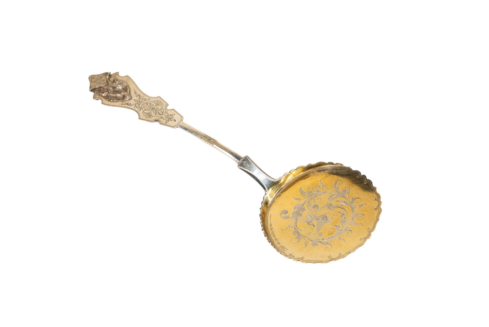 Duhme & Co. Victorian Coin Silver Tomato Server: Tomato Server. Coin Silver, 19th century. Shaped handle with embossed Saxon stag head and engraved handle. Gold wash interior with engraved floral pattern. 10 1/2 inch long Approx. 3.1ozt, manufacture