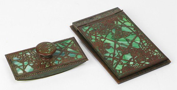 Two Tiffany Desk Pieces: Pine Cone Pattern, calendar with original oak back and blotter, stamped Tiffany Studios/New York Size: 5 x 7.75 and 3 x 5.75
