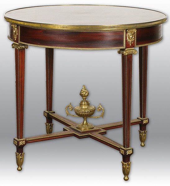 Louis XV Style Rosewood Drum Table: Late 20th century, fine bronze figural ormolu mounts, stretcher base with tapered inlaid legs, original finish Size: 30.35 x 29h
