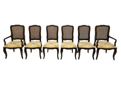 Baker Furniture French Country Dining Chairs: Baker Furniture French Country Dining Chairs. Oak dining chairs, set of 6. Curved crest rail over a cane back. Silk upholstery over scalloped aprons resting on cabriole legs. Manufacture's label to un
