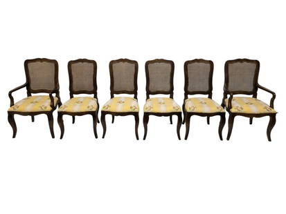 Baker Furniture French Country Dining Chairs: Baker Furniture French Country Dining Chairs. Oak dining chairs, set of 6. Curved crest rail over a cane back. Silk upholstery over scalloped aprons resting on cabriole legs. Manufacture's label to un