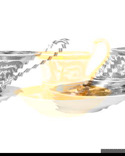 19th Century KPM Gilt Porcelain Cup and Saucer: 19th Century KPM Gilt Porcelain Cup and Saucer. Manufacture's marks to underside. Cup - 4 1/4w x 3 1/4d x 4h. Saucer - 5 5/8dia x 1 1/4h.