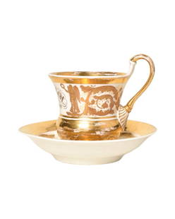 19th Century KPM Gilt Porcelain Cup and Saucer: 19th Century KPM Gilt Porcelain Cup and Saucer. Manufacture's marks to underside. Cup - 4 1/4w x 3 1/4d x 4h. Saucer - 5 5/8dia x 1 1/4h.