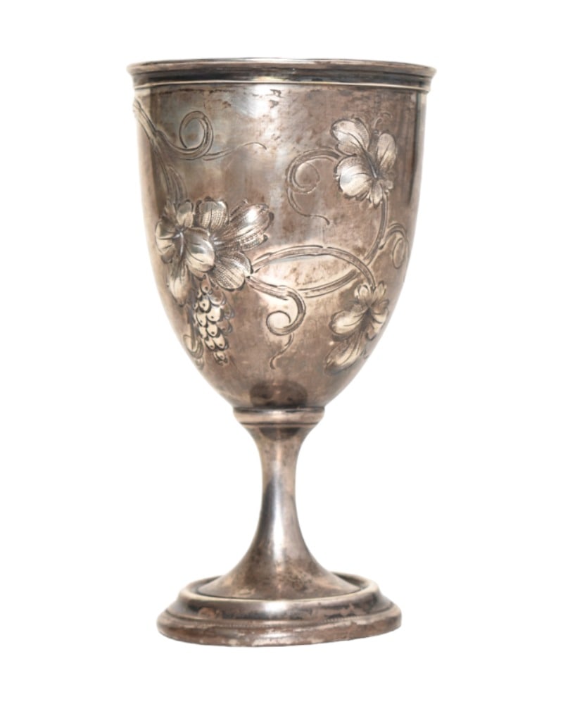 19th Century Coin Silver Goblet: 19th Century Coin Silver Goblet. High relief flowering branches and having a pedestal base. Weight - 3.59 ozt. 3 dia x 5 3/8.