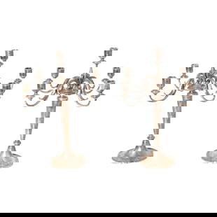 Tiffany & Co. Sterling Silver Candelabra #A18029: Tiffany & Co. Sterling Silver Candelabra #A18029. A fine pair of five branch sterling silver candelabras with hand chased scrolled acanthus leaves and embossed shells. Scalloped footed bases. Marked T