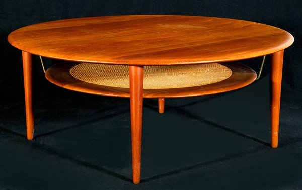 Peter Hvidt and Orla Molgaard Coffee Table: Round two-tiered teak, cane, and brass coffee table; John Stewart Button, tapered legs, underside beveled, manufactured by France & Sons, Denmark 39"Dx19.5"H