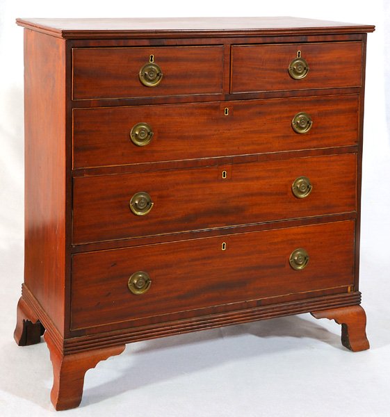 Chippendale Chest: Mahogany chest with two over three drawers, replaced brasses, replaced ogee bracket feet, Poplar secondary wood circa 1790