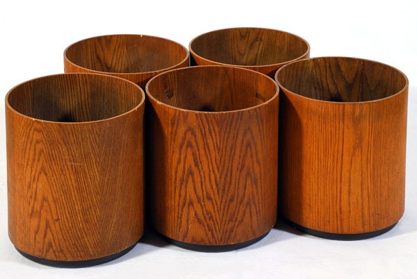 Jens Risom Waste Baskets: Five walnut cylindrical waste baskets, black plastic bases with original label, 14.25"Hx12"D