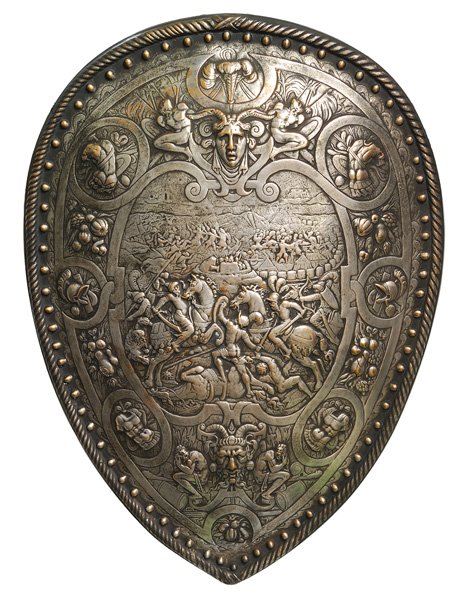 19th C. Iron Shield: Embossed with mythological figures in battle, embossed heads, torsos, trees and fruit, 25.75"Hx19"W