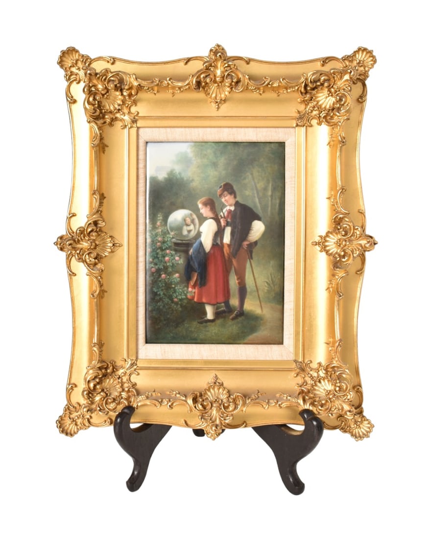 KPM Porcelain Plaque of Young Couple: Late 19th century KPM porcelain plaque of young couple looking into crystal ball. Manufacturer's mark to verso # 508 and hand marked No. 264. Plaque 9-3/4" H x 6-7/8" W. Frame 18-1/2" H x 15-1/2" W.