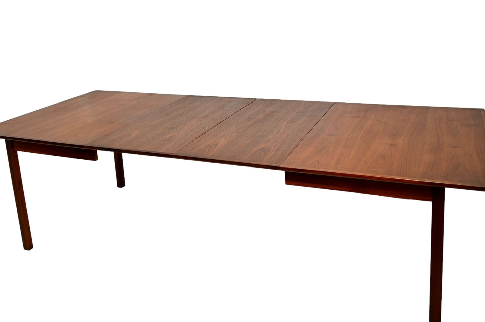 Jack Cartwright Dining Table: Jack Cartwright Dining Table. Founders, USA. 1964. Walnut. Two - 20" leaves in original cover. 104w x 42d x 29h. Closed - 64w x 42d x 29h.